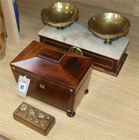 A set of 19th century French brass and mahogany scales with metric weights and a 19th century rosewood tea caddy